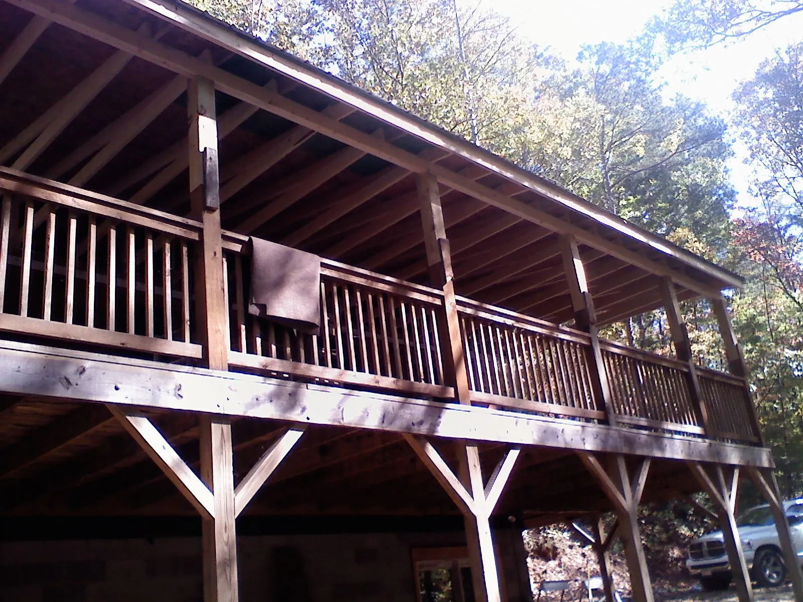 Timber framing under a new elevated porch and deck — Roof Leak Repair in Lake Toxaway by Roofing Brothers
